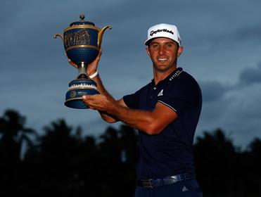 Dustin Johnson with his second WGC trophy